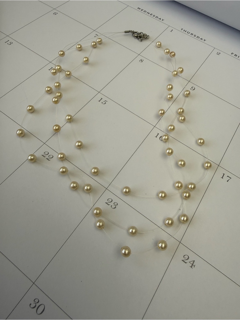 Delicate Ivory Pearl Floating Necklace